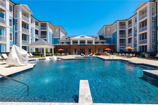 pool featuring a patio area