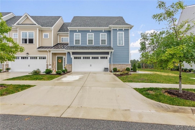 view of front of property with an attached garage, a shingled roof, brick siding, concrete driveway, and a front yard