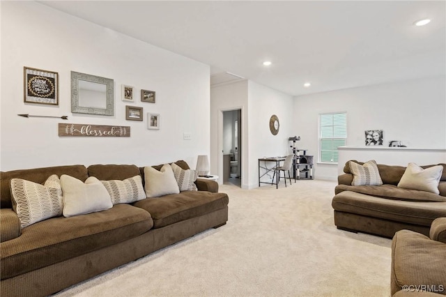 living room featuring carpet flooring and recessed lighting