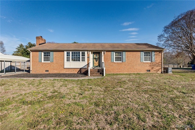 view of front of house featuring crawl space, a chimney, a front lawn, and brick siding