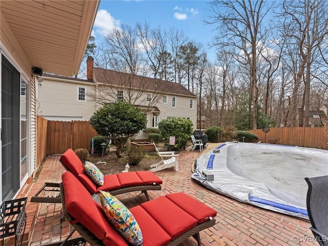 view of patio / terrace with a fenced backyard and an outdoor hangout area