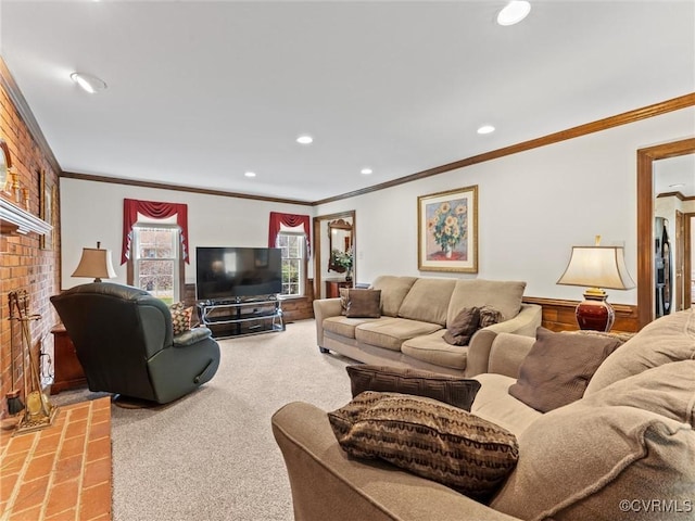 living area featuring a brick fireplace, recessed lighting, ornamental molding, and light colored carpet