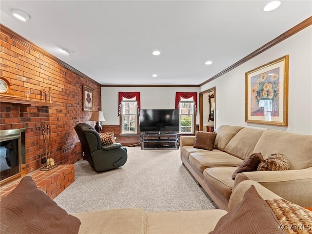 living room with brick wall, crown molding, carpet floors, a fireplace, and recessed lighting