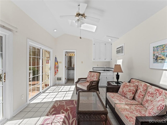 living room with light tile patterned floors, ceiling fan, a wall unit AC, visible vents, and vaulted ceiling