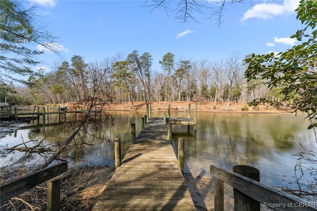 view of dock with a water view