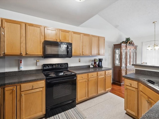 kitchen with dark countertops, hanging light fixtures, an inviting chandelier, vaulted ceiling, and black appliances