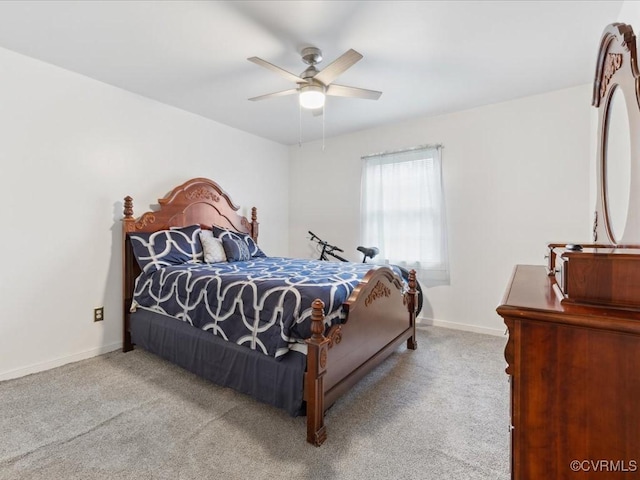 bedroom featuring carpet, baseboards, and ceiling fan