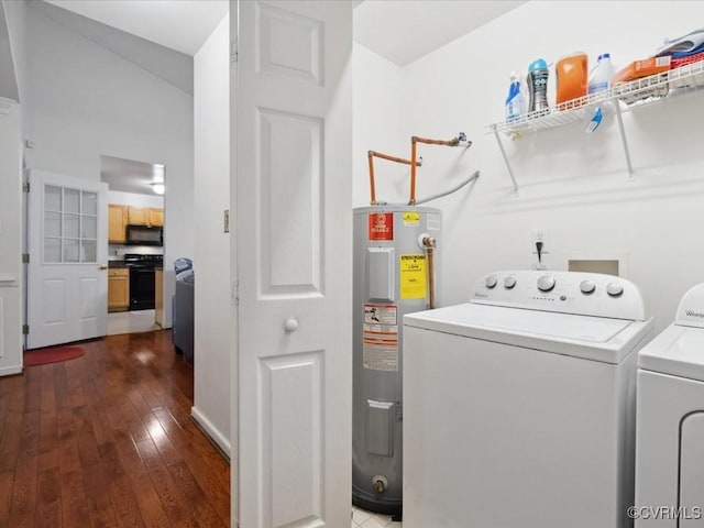 clothes washing area with water heater, dark wood-style flooring, and independent washer and dryer