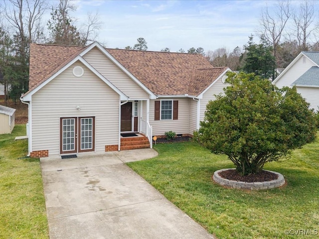 ranch-style house featuring crawl space, roof with shingles, and a front lawn