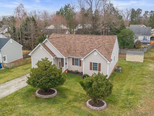 single story home featuring crawl space, fence, a front lawn, and cooling unit