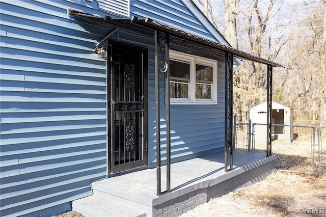 property entrance featuring fence