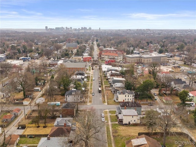 birds eye view of property with a city view