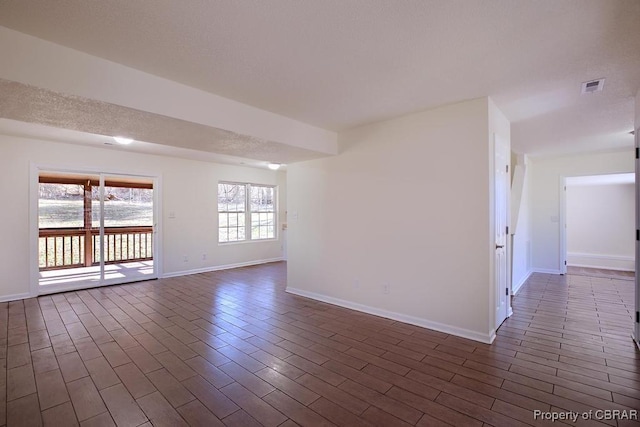 5475 Crany Creek Dr, Gloucester, VA 23061 - spare room with baseboards and dark wood-style floors