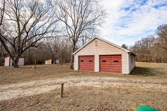 view of detached garage