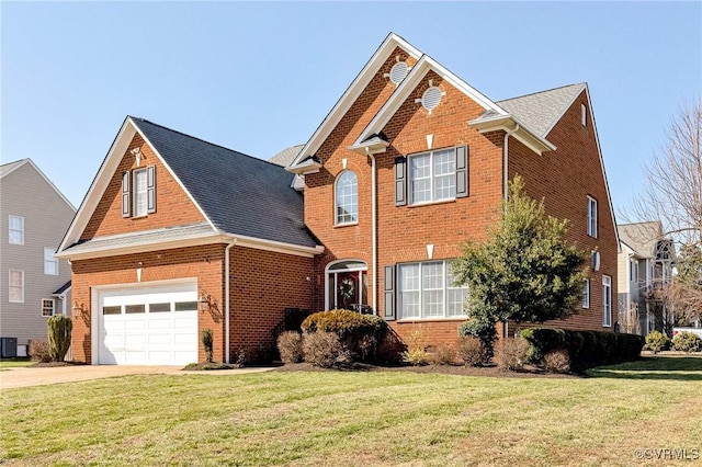 traditional-style house with brick siding, crawl space, concrete driveway, and a front lawn