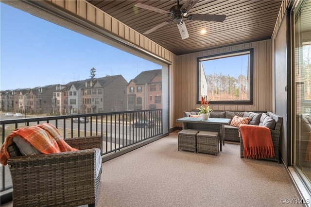 balcony with ceiling fan, a residential view, and an outdoor hangout area