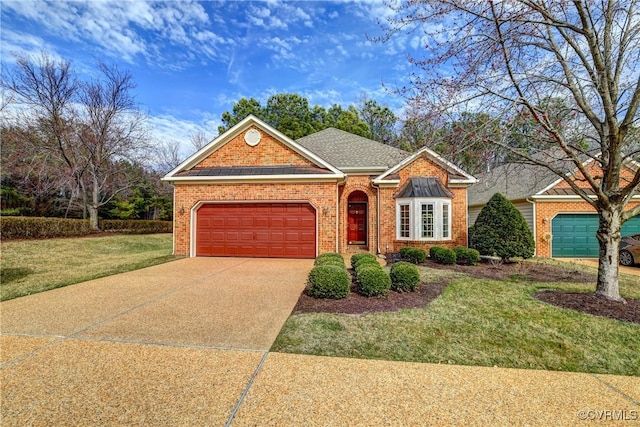 view of front of home with an attached garage, brick siding, a shingled roof, driveway, and a front lawn