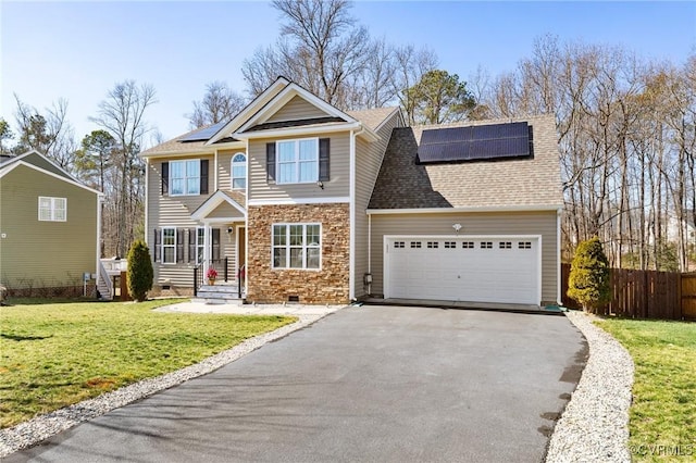 view of front facade with driveway, crawl space, an attached garage, fence, and a front yard