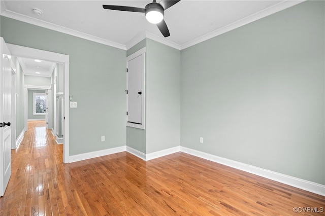 616 N 37th St, Richmond, VA 23223 - unfurnished bedroom with light wood-style floors, ornamental molding, and a ceiling fan