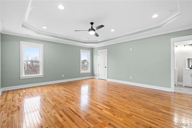 616 N 37th St, Richmond, VA 23223 - unfurnished room with a tray ceiling, light wood-style floors, ceiling fan, ornamental molding, and a smoke detector