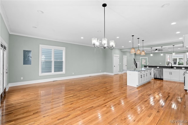 616 N 37th St, Richmond, VA 23223 - unfurnished living room featuring electric panel, crown molding, light wood-type flooring, a chandelier, and recessed lighting