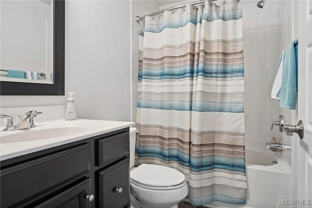 bathroom featuring toilet, shower / bathtub combination with curtain, and vanity