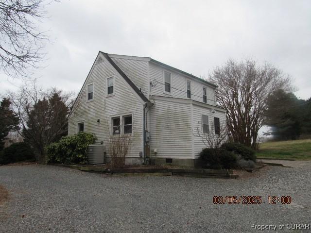 view of property exterior featuring central AC unit