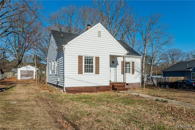 bungalow-style home with roof with shingles, crawl space, a chimney, and fence