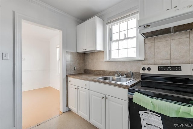 kitchen featuring tasteful backsplash, electric range, white cabinets, a sink, and under cabinet range hood