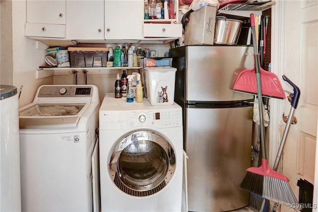 washroom with washer and dryer and laundry area