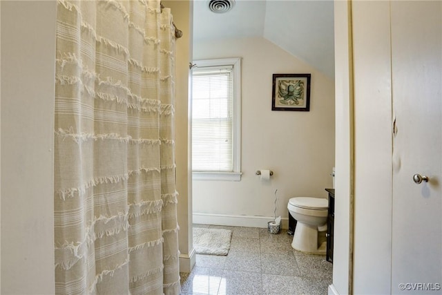 full bathroom featuring lofted ceiling, visible vents, granite finish floor, toilet, and baseboards