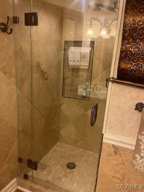 bathroom featuring a stall shower