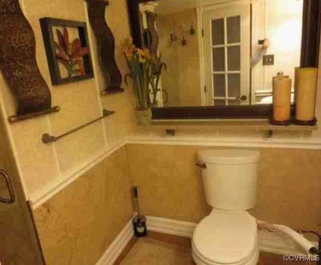 bathroom featuring toilet