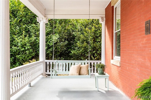 view of patio featuring a porch