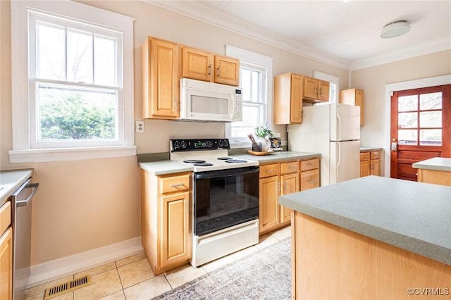 kitchen featuring ornamental molding, white appliances, light tile patterned flooring, and light brown cabinets