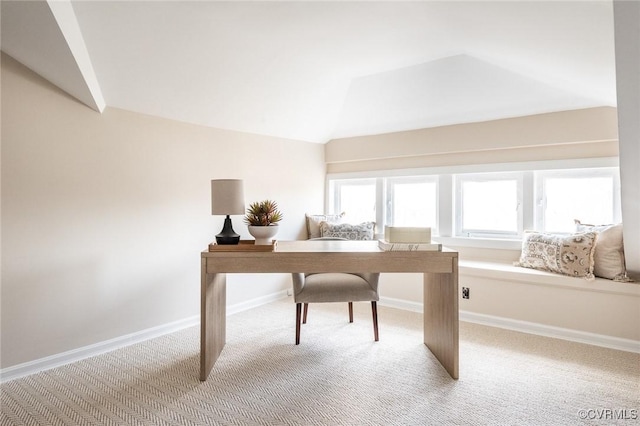 home office with carpet, baseboards, and vaulted ceiling