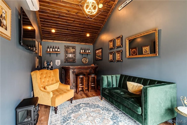 living area with wood finished floors, wood ceiling, a dry bar, and vaulted ceiling