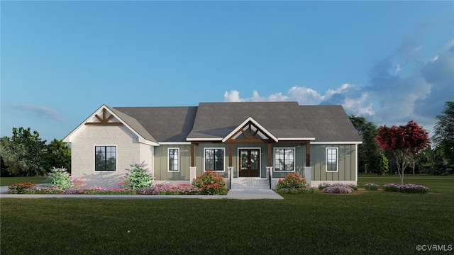 view of front of home with board and batten siding and a front yard