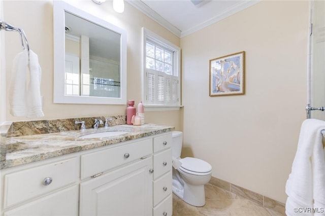 bathroom featuring toilet, tile patterned floors, ornamental molding, and vanity