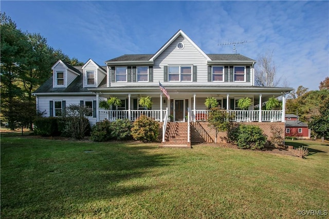 view of front facade featuring a porch and a front lawn