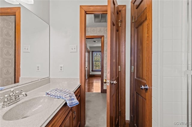 bathroom featuring visible vents and vanity