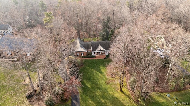 aerial view featuring a view of trees