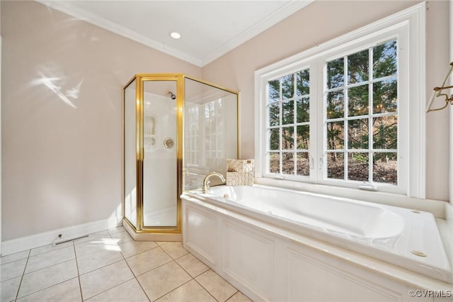 bathroom with a garden tub, tile patterned flooring, baseboards, a stall shower, and crown molding