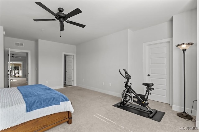 carpeted bedroom with ceiling fan, visible vents, and baseboards