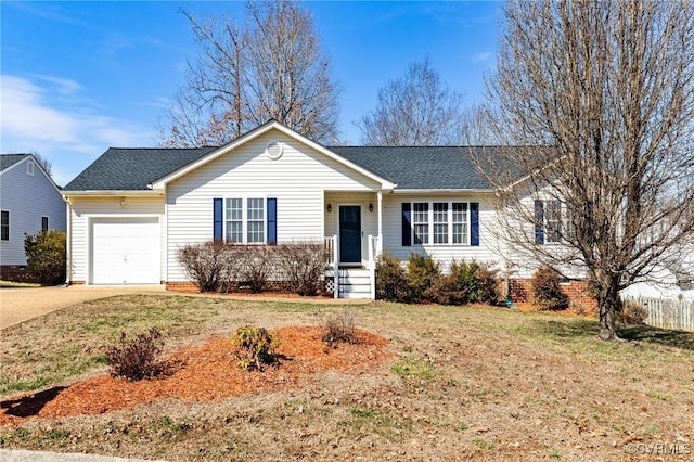 ranch-style home with concrete driveway, a front lawn, crawl space, and an attached garage