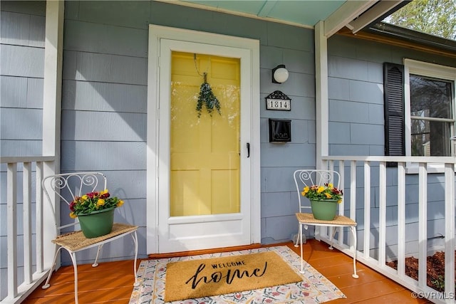 entrance to property with a porch