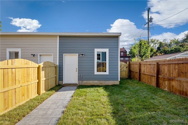 exterior space featuring a fenced backyard