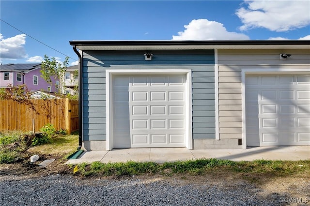 garage featuring fence