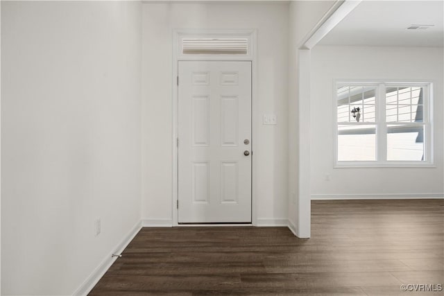 11777 Pine Needles Dr, New Kent, VA 23140 - entrance foyer with dark wood-style floors and baseboards