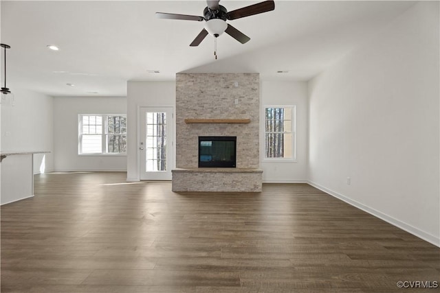 11777 Pine Needles Dr, New Kent, VA 23140 - unfurnished living room with ceiling fan, dark wood-style floors, baseboards, a stone fireplace, and recessed lighting